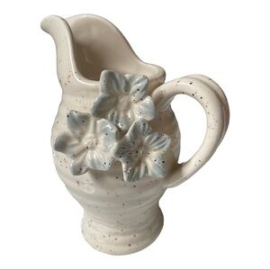 𝅺grasslands Road 6” speckled pottery pitcher with applied flowers.